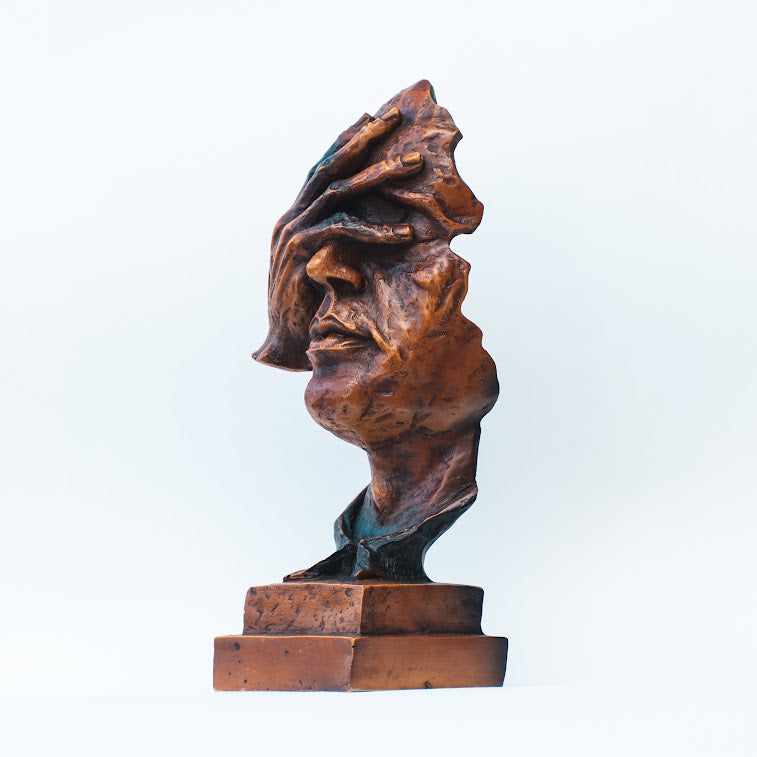 Male Face Figurine